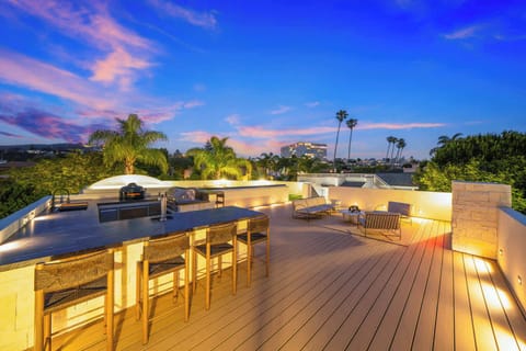 Welcome to a home that is a true work of art. From the striking modern exterior and custom lighting to the curated art inside, every element is designed to impress.