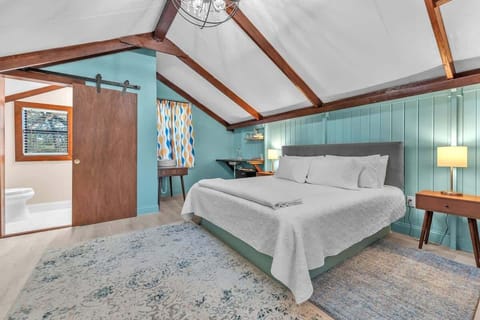 Drift off to sleep in the plush comfort of the king-sized bed.