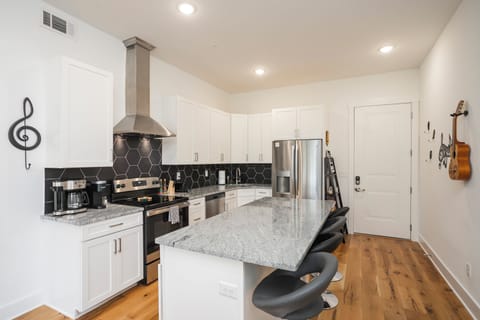 As you enter The Nashville Scene Suite, you'll walk right into the spacious kitchen. 