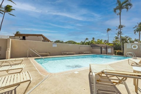 Days melt away poolside amidst swaying island palms.