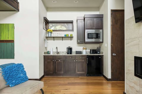 Enjoy the convenience of a well-equipped kitchenette, perfect for preparing light meals or snacks.