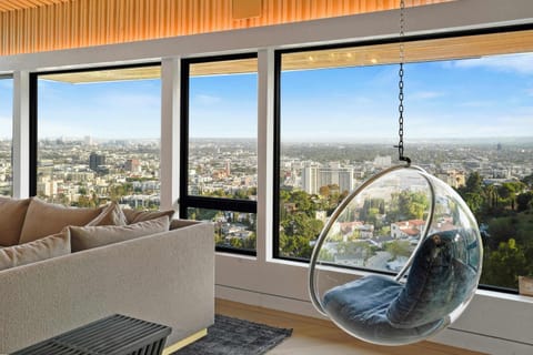 The art of stillness, framed by glass and sky.