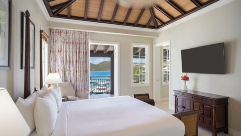 Stretch out and enjoy entertainment with soothing water views nearby.