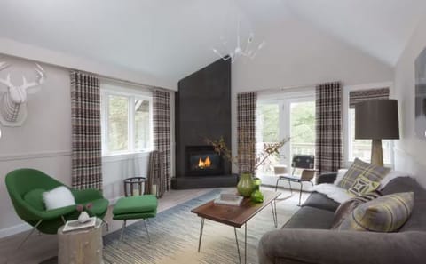 Gather by the glowing fireplace for cozy evenings and conversation.