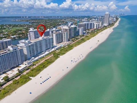 Stay steps from the sand in a beachfront high-rise—perfect for ocean lovers and coastal explorers.

