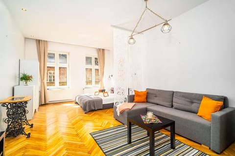 Living Area with Sofa Bed, Smart TV | Book Now with RENTUJEMY.COM