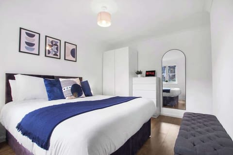 Spacious Master Bedroom: A bright and stylish room with a comfortable king-size bed, perfect for a restful night’s sleep.
