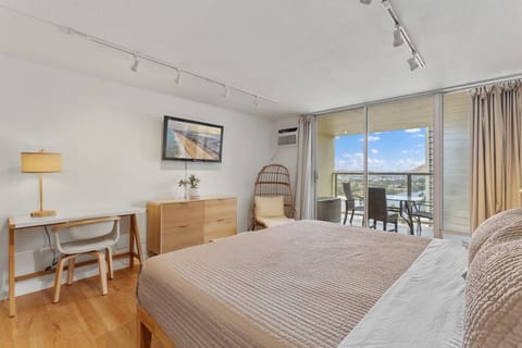 Wake up to tropical sunshine and sweeping city and mountain views from your plush King bed.