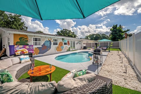 Backyard with mini golf and pool/spa