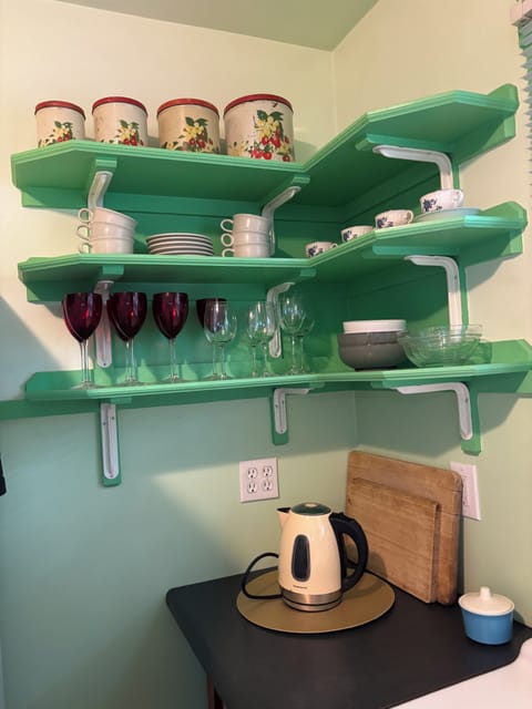 Open shelving with ample dishes