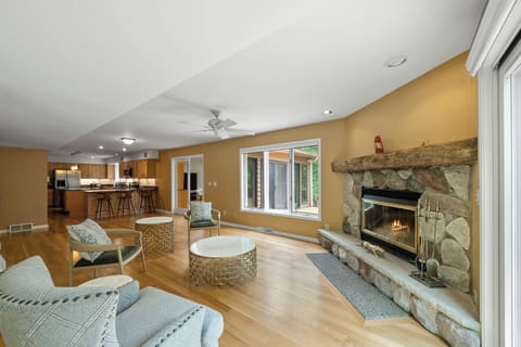Open concept living room to kitchen & dining