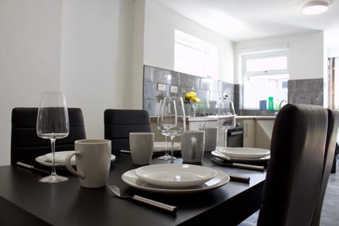 The dining area is fully equipped with all the amenities you need to enjoy your meals to the fullest.