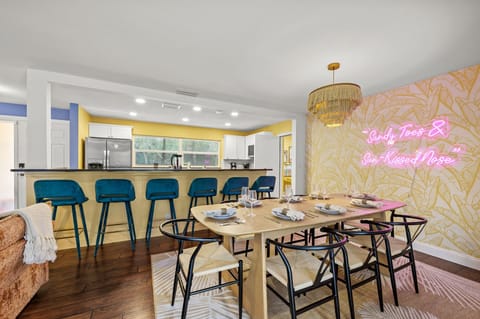 The heart of the home! Whip up your favorites in the modern kitchen and enjoy them around the inviting dining table just steps away.