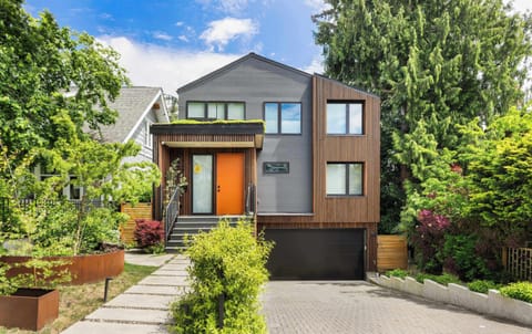 Welcome to  our home! Modern house with warm wood accents​