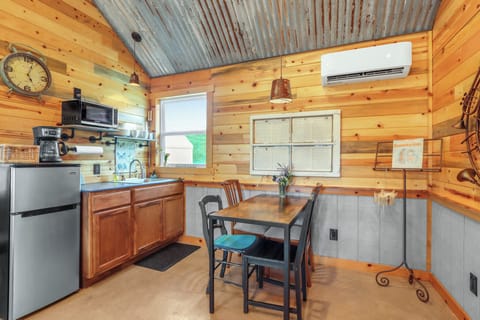 The cabin has a small kitchenette with refrigerator, microwave and coffee pot.