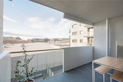 Take in peaceful rooftop views from the private balcony — an ideal spot for alfresco breakfasts or a glass of wine at sunset.