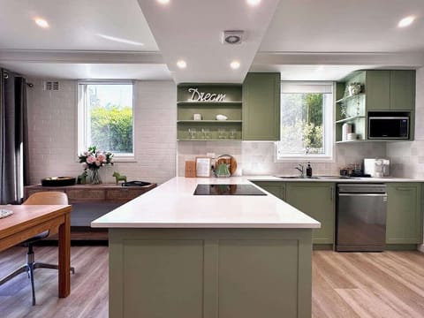 Full kitchen with Espresso Machine, Dishwasher, stove and oven & fridge freezer. 