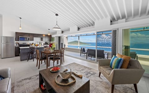 Open plan kitchen into dining and living room - all with a gorgeous view