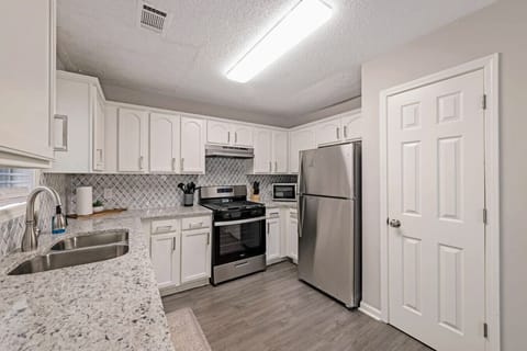 Kitchen that is stocked with basic cooking tools