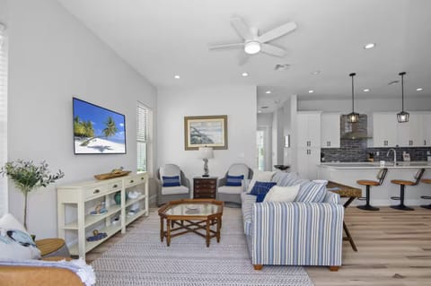 Blue Lagoon - Comfortable living room area with a cozy couch and chairs—perfect for relaxing.