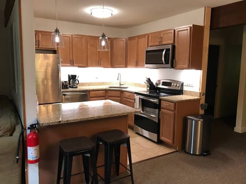Stainless steel and granite kitchen