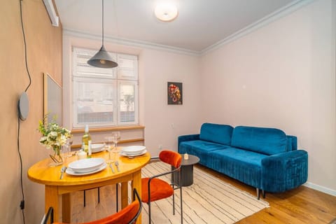 Living Room with Smart TV and Dining Table | Book Now with RENTUJEMY.COM
