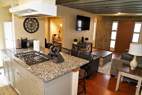 Kitchen - Fully Stocked, Spices, Modern Appliances: Island Stovetop with Hood, Coffee Machine, and MORE!