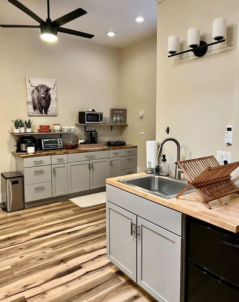 Kitchenette - Sink, Cabinet Space, Trash and Recycling Combo Bins