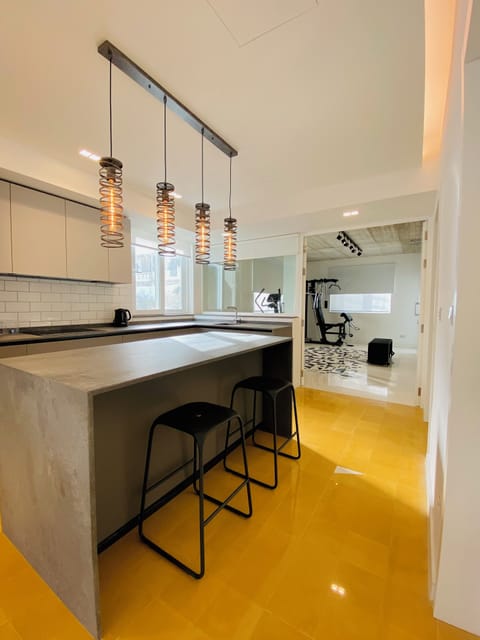 Enjoy the fully equipped kitchen offering large work deck. 