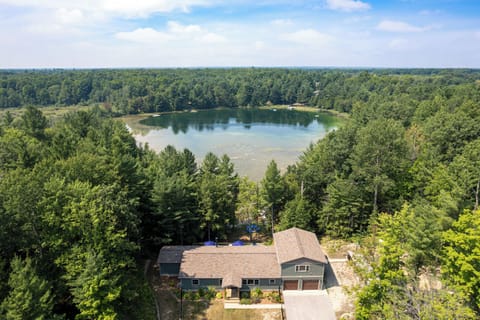 This property sits on 12 acres with private dock overlooking the lake