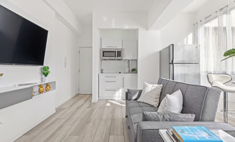 A fluid design connects the kitchen and living area for easy socializing.

