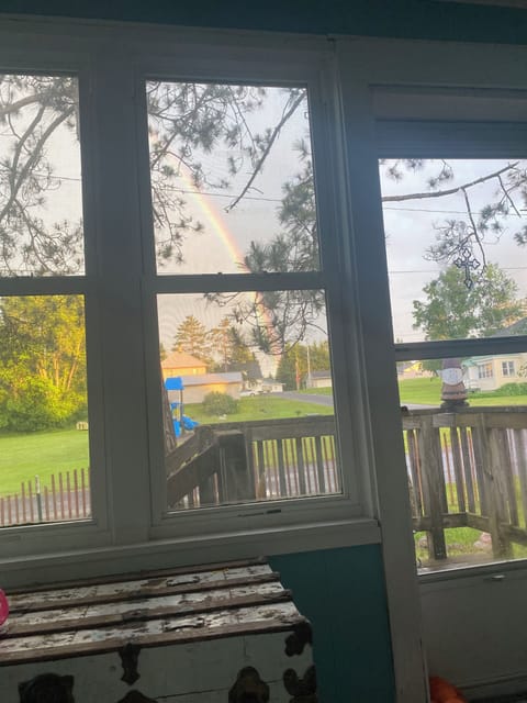 What a beautiful and hopeful image! A rainbow appearing over your patio!