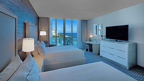 Kick back after the beach with sofa seating and big TV.