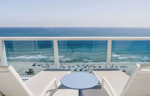 Watch the shoreline come alive from your breezy oceanfront perch.