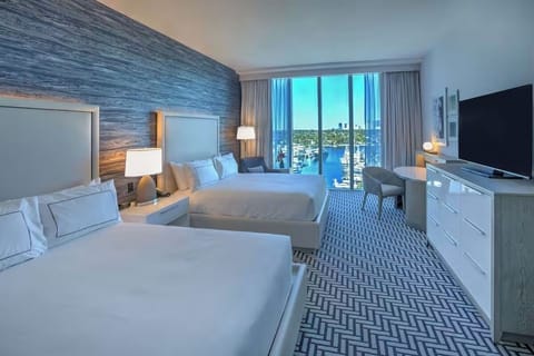 Wake up to marina views from crisp, plush beds.