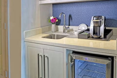 Refresh with an in-room kitchenette for snacks and morning coffee.