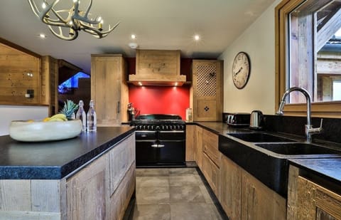 Large open kitchen with AGA gas cooking piano