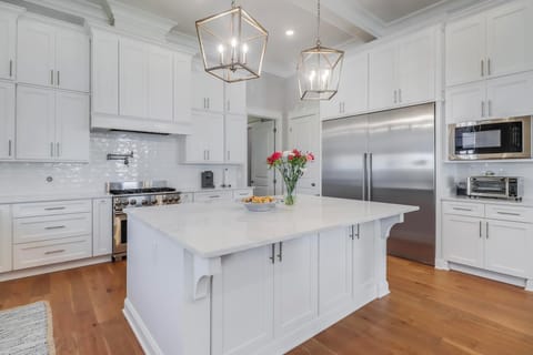 Enjoy cooking for your family in the fully stocked kitchen.