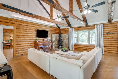 Relax in the bright, open living area with plush seating and welcoming ambiance.