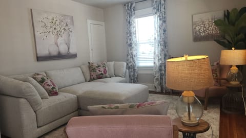 Comfortable Living area with large screen Smart TV