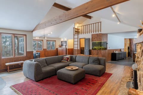 View of living room, showing the loft and reading room