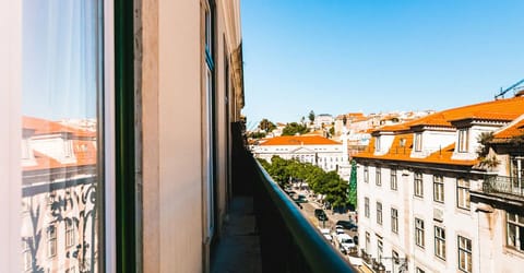 Soak in sunlit rooftop views and breezy city air.