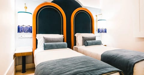 Settle in easily with twin beds and boutique-hotel comfort.