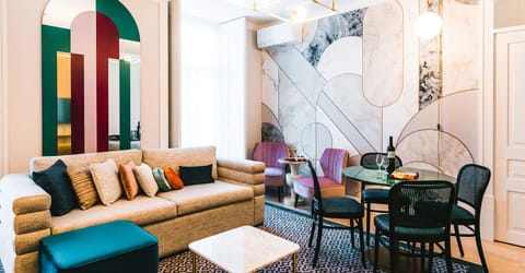 Gather for drinks on the sofa beside the stylish dining nook