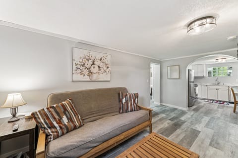 The downstairs living room has a full-sized futon with linens provided. 