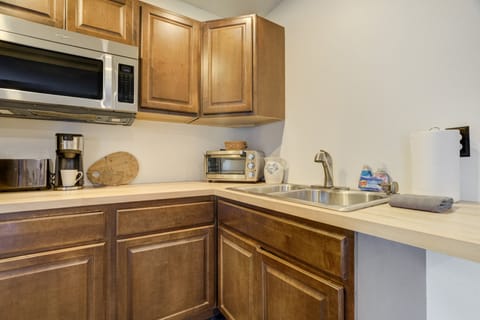 Kitchenette with essentials (no dishwasher or full oven/stove).