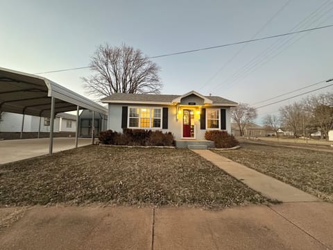 This charming one-bedroom features 1.5 baths and a spacious carport for two cars