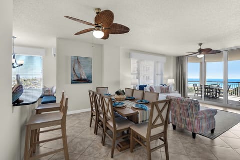Kitchen with Bar Seating, Breakfast Nook, Dining Room, Living Room, and Balcony
