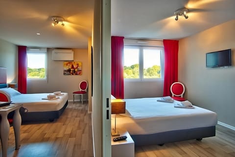 Imagine shared mornings in a bright, spacious twin-bedroom suite.