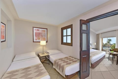 Settle into bright twin beds with calming, simple comfort.